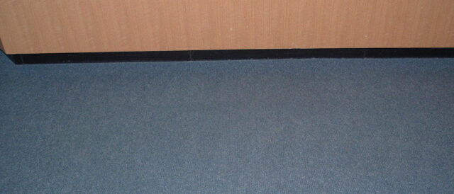 Professional carpet cleaning equipment in use